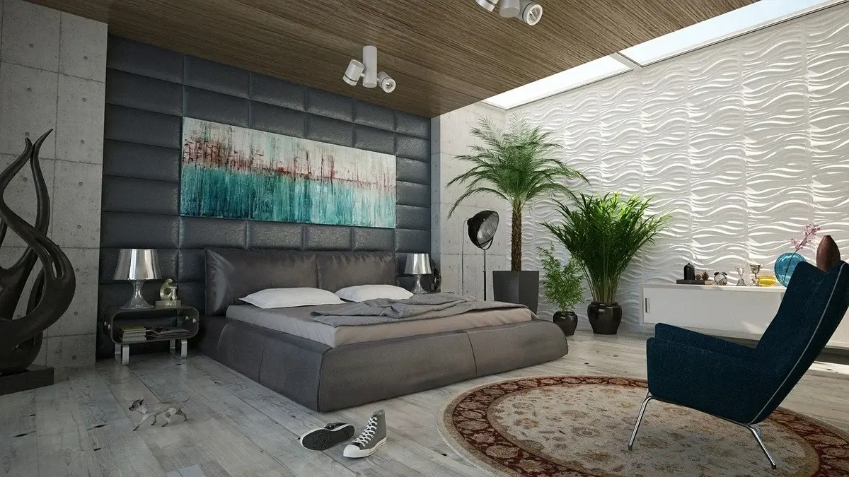 Sypialnia utrzymana w szarościach z łóżkiem tapicerowanym w centralnym punkcie
