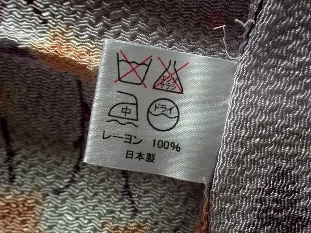 Jak czytać symbole na metkach dotyczące prania odzieży ?