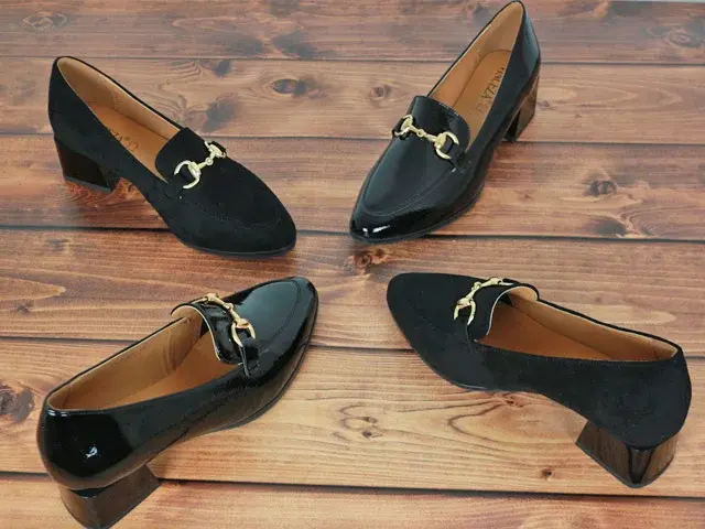 Prezentacja damskich czółenek czarnych z metalowym złotym wykończeniem na średnim obcasie