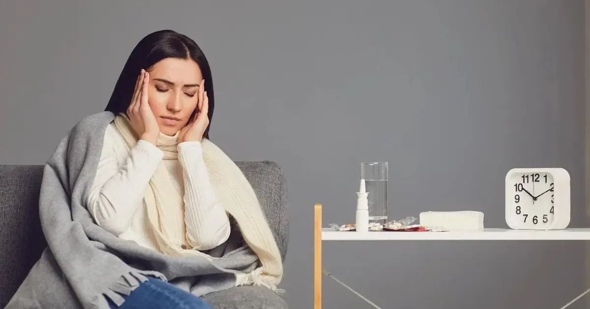 Kobieta źle się czuje i ma powikłania po grypie.