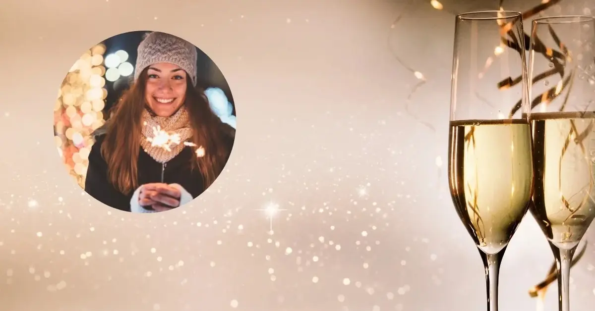 Kobieta trzyma zimne ognie i składa życzenia.