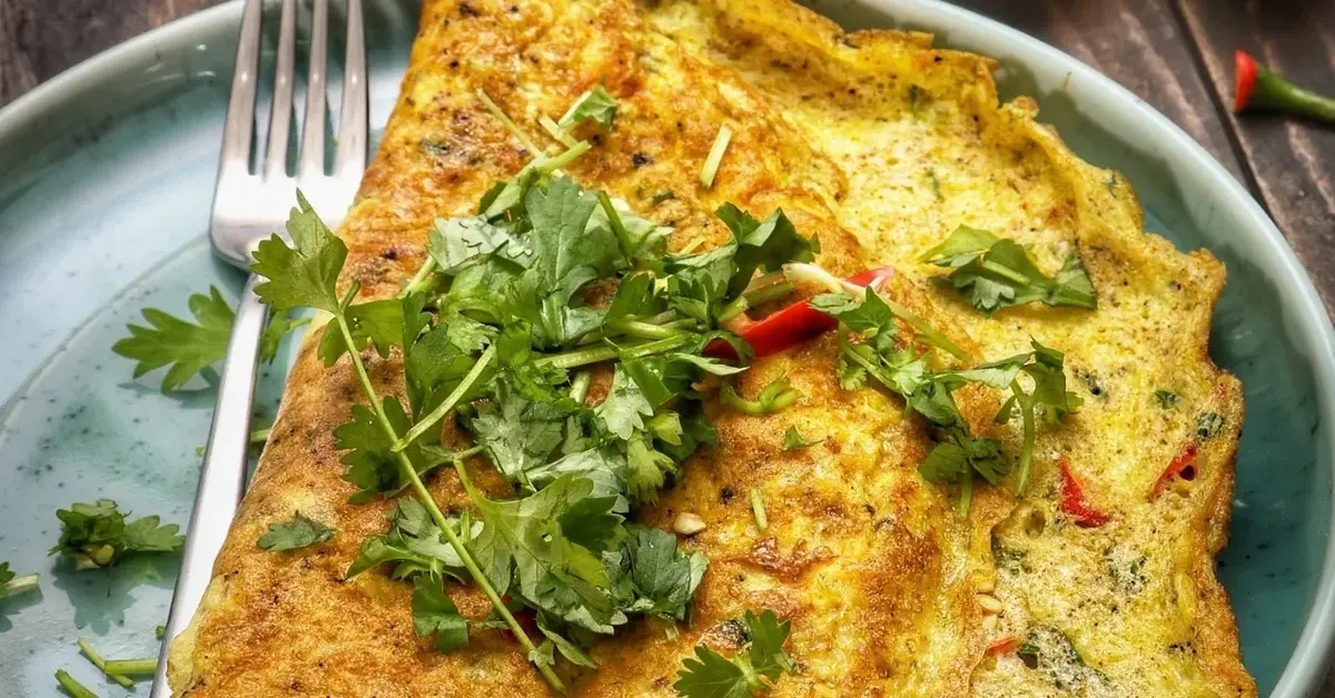 Omlet z chilli, pietruszką i serem na kolację.