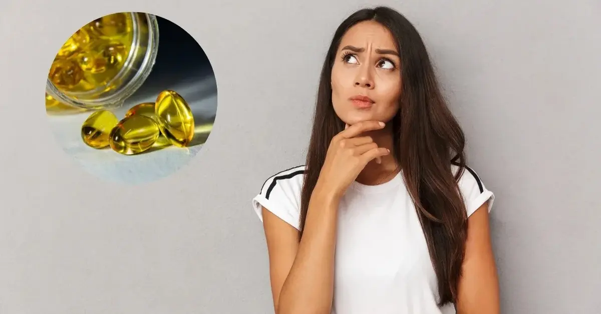 Kobieta myśli nad witaminą D.